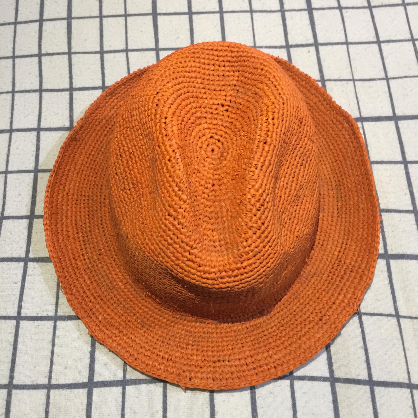 Madagascar orange handcrafted fedora hat made from premium quality raffia.
